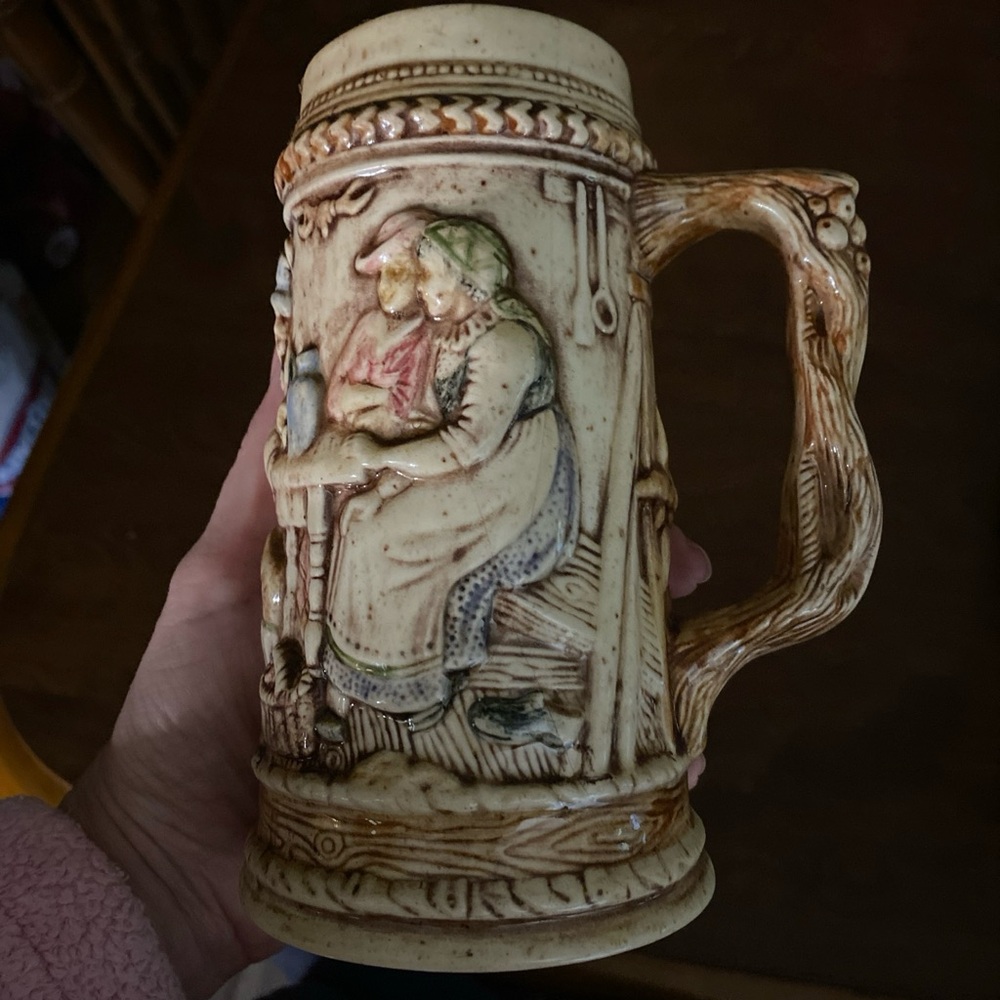 Stein Mug People Around Table Pup Scene